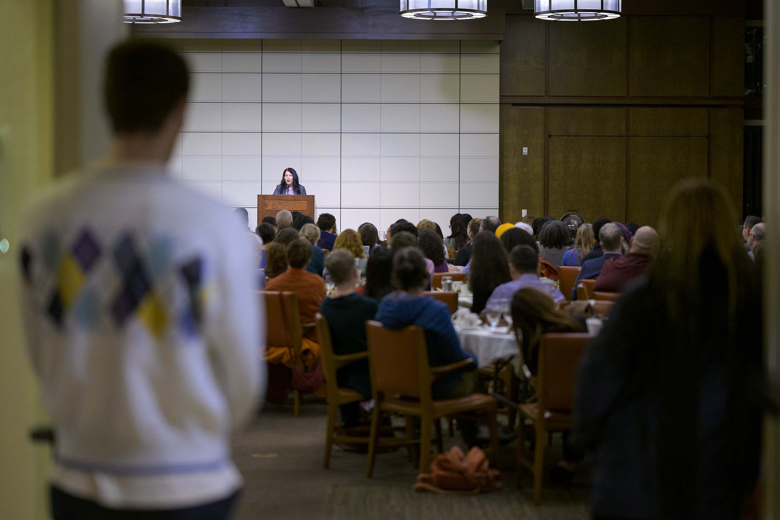 Student attending Ada Limon's Ath talk.