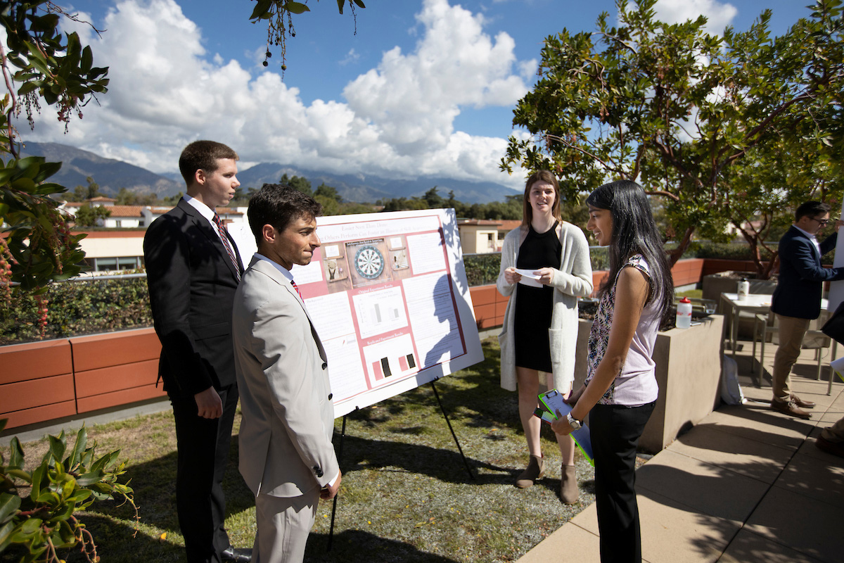 Psychological Science students presenting on the Kravis Center terrace.