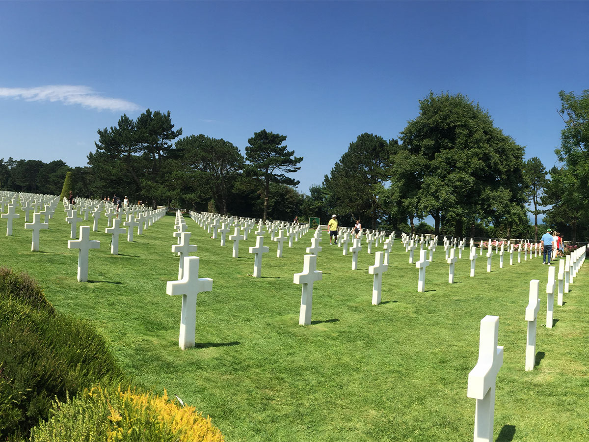 Grassy gravesite for veterans in the afternoon.