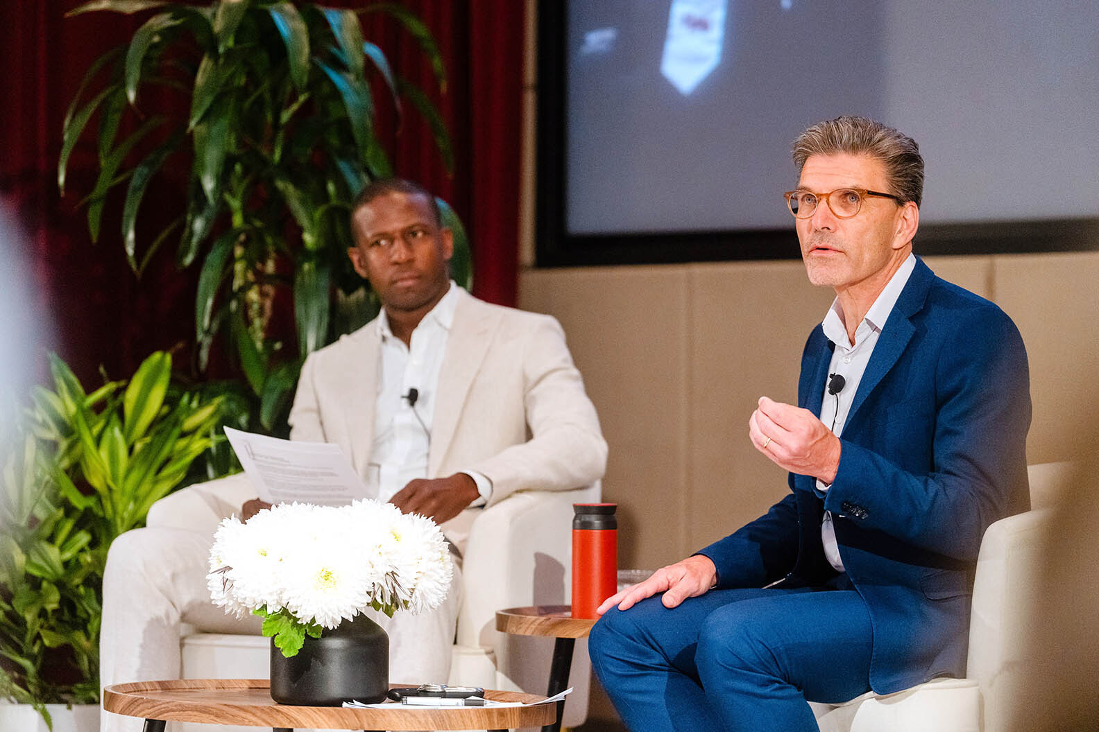 Antoine Grant ’07 (left) and President Hiram Chodosh at the Town Hall Q&A during Alumni Weekend 2025.