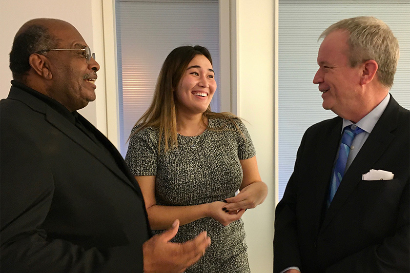 Ambassador C. Steven McGann (left),  intern Sophia Grossman (center), and Larry Edward André Jr.