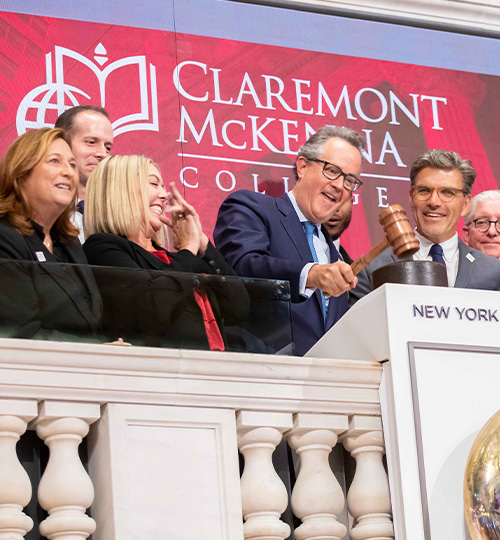 Students and members ring the New York Stock Exchange closing bell.