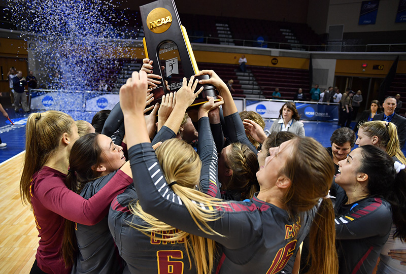 The Athenas Volleyball team celebrating their NCAA Division III win in 2017.