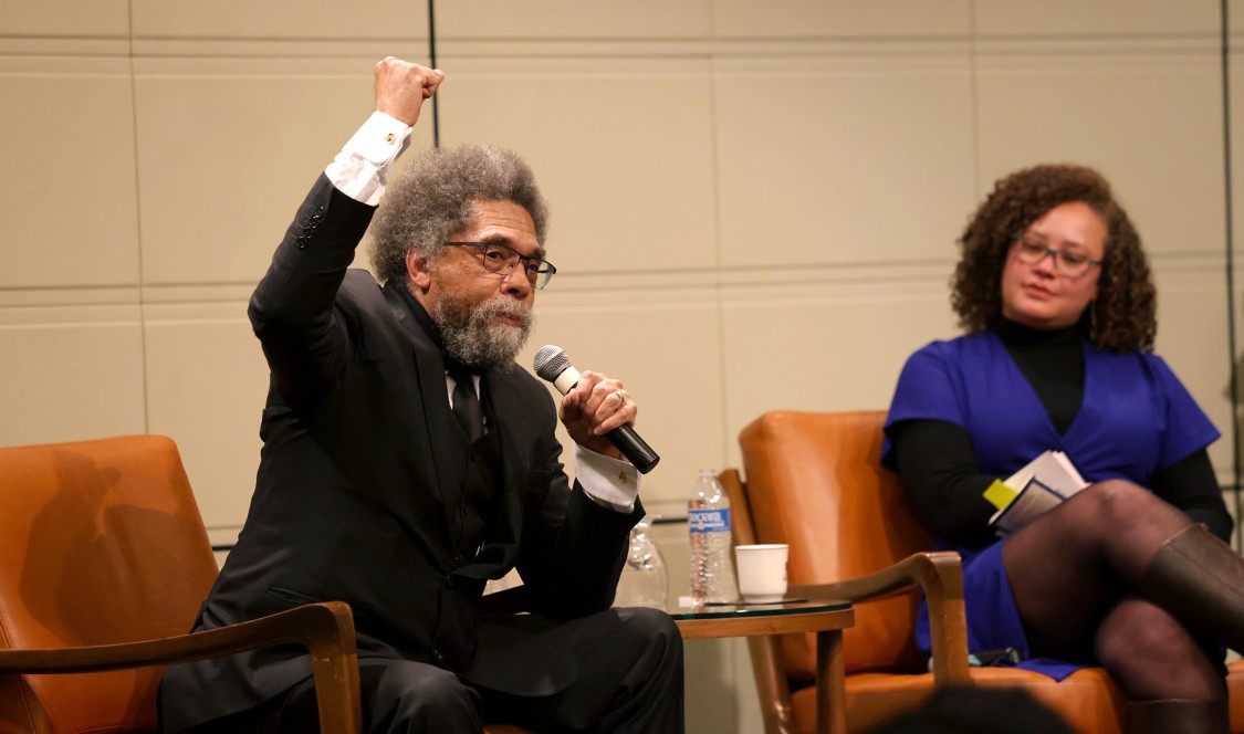 Philosopher and professor Cornel West speaking at the Ath, facilitated by Briana Toole.