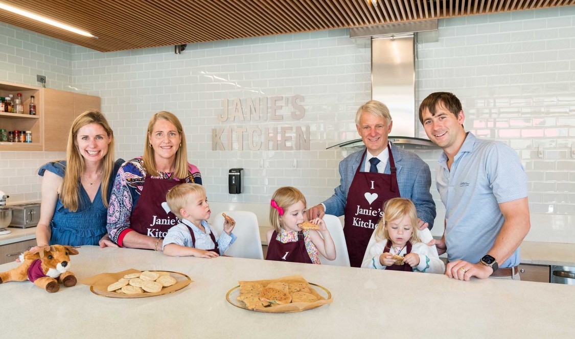 Ken Valach ’82 and his family in Janie's Kitchen.