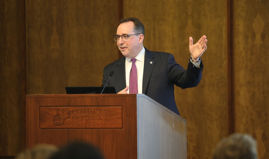 Dean Logan at podium