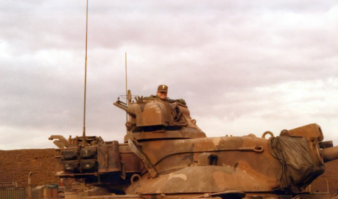 Gary Anderson ’76 in the turret of a military tank.