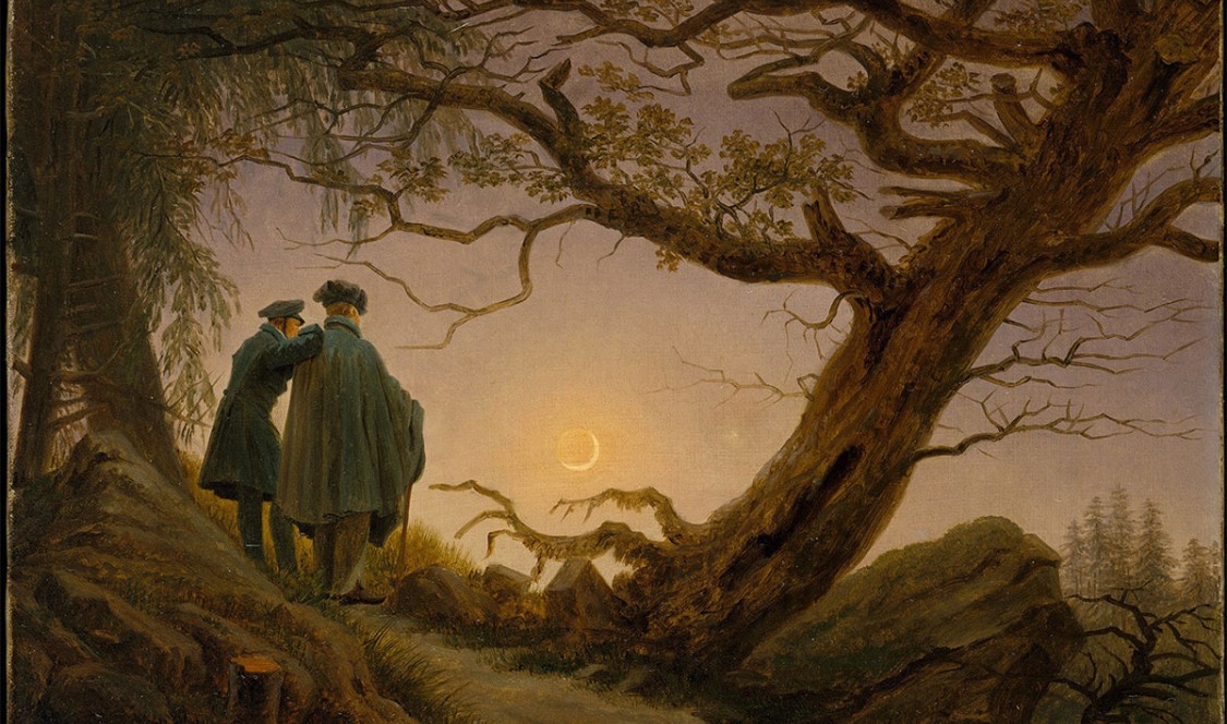 Men contemplating the moon