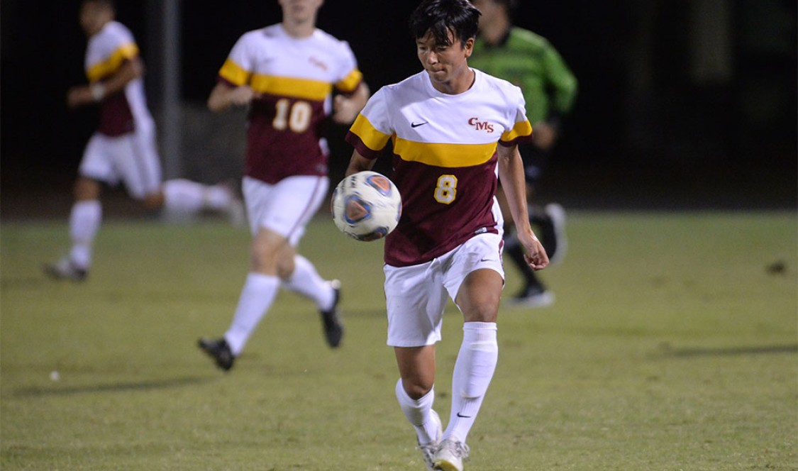 CMS men's soccer player Yusuke Kobayashi with the ball