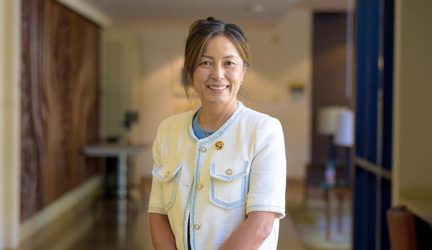 Stella Ho '97 in the Ath lobby