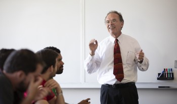 Professor Pitney addresses his class with a smile