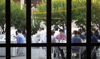 View of CMC’s first 75th Anniversary Distinguished Speakers event dinner in the patio from inside the auditorium.
