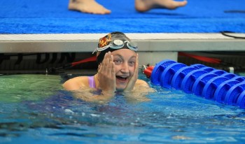Augusta Lewis wins national title in Women's Swimming.