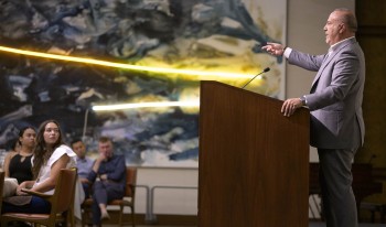 Ath speaker Mike Madrid speaking at podium