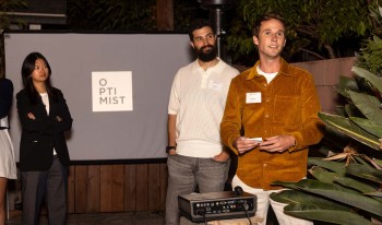 Zach Ingrasci and Chris Temple speaking at Optimist event