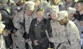 Robin Williams with U.S. Marines at a USO show in Afghanistan, December, 2010. Williams embraced the CMC ethos of service by giving his time, energy and talents to the troops.