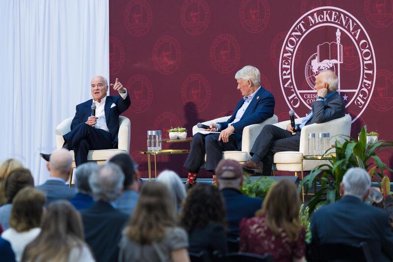 Ken Valach ’82, Henry Kravis ’67, and George Roberts ’66 P’93 on stage during their fireside chat at CMC Leads: The Summit.