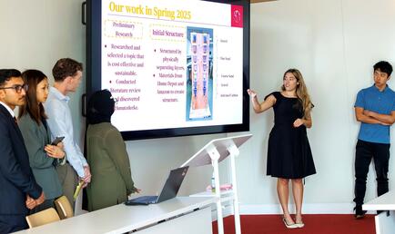 CMsci students giving a presentation